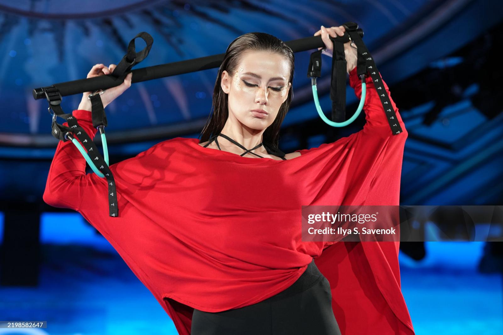 NYFW Model with Pilates Equipment on the runway